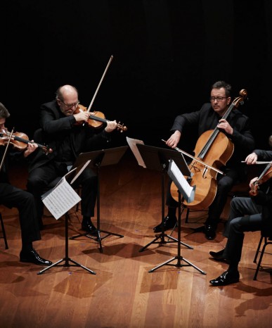 Photo of the Silesian String Quartet on the stage of the NOSPR chamber hall
